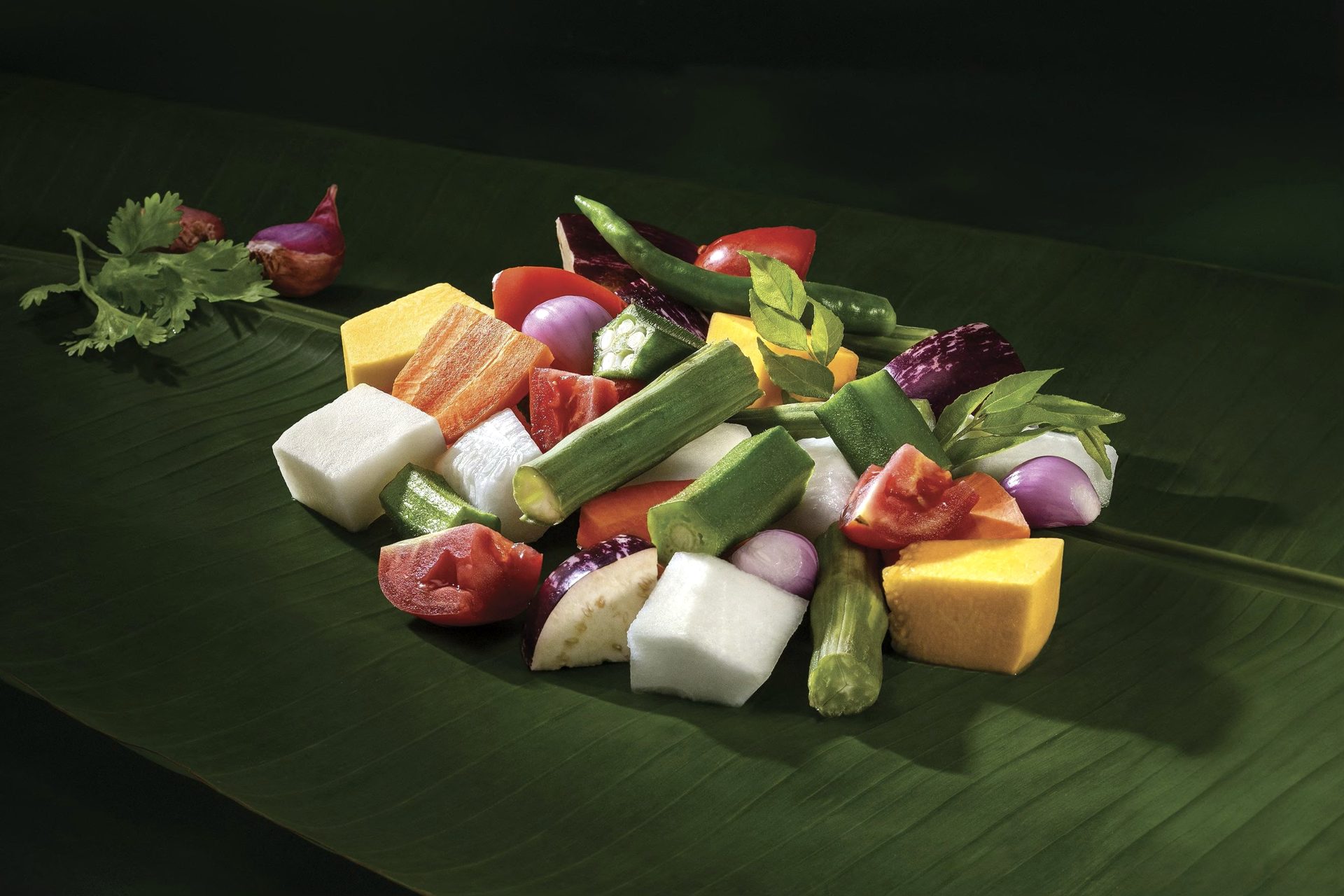 Fresh-cut Kerala vegetables on a banana leaf — Tropical Roots